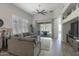Open-concept floor plan featuring a spacious living room with backyard views and ample natural light at 19475 N Grayhawk Dr # 1046, Scottsdale, AZ 85255