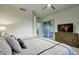 Spacious main bedroom with abundant natural light and a large dresser for ample storage at 19475 N Grayhawk Dr # 1046, Scottsdale, AZ 85255