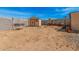 Large backyard featuring a storage shed, swing, and plenty of space for outdoor activities at 20053 N 15Th Dr, Phoenix, AZ 85027