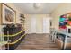 Bonus room with storage, desk and shelving at 20053 N 15Th Dr, Phoenix, AZ 85027