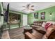 Inviting living room featuring wood floors, fireplace and comfortable seating at 20053 N 15Th Dr, Phoenix, AZ 85027