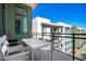 Relaxing balcony with seating area and a view of the surrounding cityscape at 3131 N Central Ave # 7002, Phoenix, AZ 85012