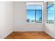 Well-lit, comfortable bedroom with wood floors and natural light with a nice view of the city at 3131 N Central Ave # 7002, Phoenix, AZ 85012