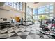 Spacious gym with modern equipment and floor to ceiling windows at 3131 N Central Ave # 7002, Phoenix, AZ 85012