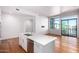 Kitchen island with stainless steel dishwasher and sink, plus lots of natural light and hardwood floors at 3131 N Central Ave # 7002, Phoenix, AZ 85012
