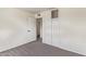 A bedroom that includes closet space and a door, offering storage and access at 3222 W Marshall Ave, Phoenix, AZ 85017