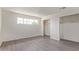 This bedroom features wood floors, a closet, and a window for natural light at 3222 W Marshall Ave, Phoenix, AZ 85017