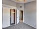 Bedroom with gray carpet flooring and an closet featuring a sliding door at 3339 W Mohawk Ln, Phoenix, AZ 85027
