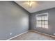 Bedroom with carpet flooring, a ceiling fan, and a window providing ample light at 3339 W Mohawk Ln, Phoenix, AZ 85027