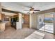 Open-concept dining area with a sliding glass door and tile flooring at 3339 W Mohawk Ln, Phoenix, AZ 85027