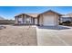 Charming single-story home with a gravel front yard and a convenient attached garage at 3339 W Mohawk Ln, Phoenix, AZ 85027