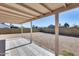 Covered patio with tile flooring and a view of the spacious gravel backyard at 3339 W Mohawk Ln, Phoenix, AZ 85027