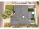 Aerial view of the home showing the roof, backyard with a pool, and surrounding neighborhood at 3619 N 87Th St, Scottsdale, AZ 85251