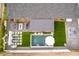 Overhead shot showcasing the home's layout, a pool, an outdoor fireplace, and ample backyard space at 3619 N 87Th St, Scottsdale, AZ 85251