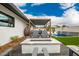 Backyard featuring a fire pit, patio area, pool, and seating at 3619 N 87Th St, Scottsdale, AZ 85251