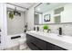 Modern bathroom featuring a double vanity, walk-in shower, and elegant fixtures for a luxurious experience at 3619 N 87Th St, Scottsdale, AZ 85251