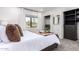 Bright bedroom boasts a window view, neutral tones, and a closet with a mirror at 3619 N 87Th St, Scottsdale, AZ 85251