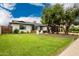 Beautifully landscaped front yard highlighting the home's modern design and inviting outdoor seating area at 3619 N 87Th St, Scottsdale, AZ 85251