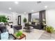 Spacious living room with gray sofas, stylish decor, and large windows for ample natural light at 3619 N 87Th St, Scottsdale, AZ 85251