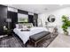 Luxurious main bedroom boasting a king-size bed, elegant decor, and ample natural light at 3619 N 87Th St, Scottsdale, AZ 85251