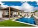 Stunning backyard with a pool, pergola, and ample seating at 3619 N 87Th St, Scottsdale, AZ 85251