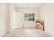 Cozy bedroom with a large window and neutral carpet at 3830 E Lakewood Pkwy # 2162, Phoenix, AZ 85048