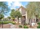Attractive apartment building featuring well-maintained landscaping and inviting walkways at 3830 E Lakewood Pkwy # 2162, Phoenix, AZ 85048