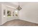 Dining room with views and modern chandelier at 4010 N 156Th Ln, Goodyear, AZ 85395