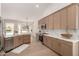 Spacious kitchen featuring stainless steel appliances, ample cabinetry, and a bright, airy feel at 4010 N 156Th Ln, Goodyear, AZ 85395