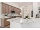 Modern kitchen with quartz countertops, stainless steel appliances, and stylish cabinetry at 4010 N 156Th Ln, Goodyear, AZ 85395
