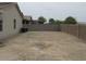 Large backyard features block wall and blank canvas for landscape at 41246 N Vine Ave, San Tan Valley, AZ 85140