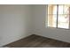 Comfortable bedroom with a large window offering plenty of natural light and a view at 41246 N Vine Ave, San Tan Valley, AZ 85140