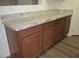 Spacious kitchen cabinets with granite countertops at 41246 N Vine Ave, San Tan Valley, AZ 85140