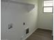 Bright laundry area featuring a window for natural light and convenient washer/dryer hookups at 41246 N Vine Ave, San Tan Valley, AZ 85140
