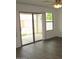Living room with sliding glass doors to the patio at 41246 N Vine Ave, San Tan Valley, AZ 85140