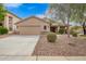 Charming single-story home with a well-maintained front yard, two car garage, and inviting curb appeal at 4433 W Phalen Dr, Phoenix, AZ 85087