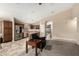 Open kitchen featuring stainless steel appliances, granite countertops, and breakfast bar seating at 4433 W Phalen Dr, Phoenix, AZ 85087