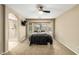 Relaxing main bedroom with bay windows and ensuite bathroom featuring dual vanities and large shower at 4433 W Phalen Dr, Phoenix, AZ 85087