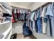 Walk-in closet with a closet organization system that maximizes storage, shelving, and hanging space at 4433 W Phalen Dr, Phoenix, AZ 85087