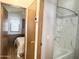 Bathroom featuring a tub and shower combination with a white marble-patterned surround at 457 S Jaspar Dr, Apache Junction, AZ 85119