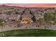 Aerial view featuring backyard pools and desert landscaping in a serene neighborhood setting at 4630 E Hazeltine Way, Chandler, AZ 85249