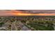 Wide aerial view showing a residential community with streetscapes and sunset sky at 4630 E Hazeltine Way, Chandler, AZ 85249