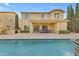 Inviting backyard showcasing a sparkling pool, covered patio, and outdoor kitchen area perfect for entertaining at 4630 E Hazeltine Way, Chandler, AZ 85249