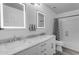 Bathroom featuring double vanity sinks, modern faucets, and updated fixtures at 4630 E Hazeltine Way, Chandler, AZ 85249