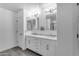Bright Primary bathroom featuring a double vanity with marble countertop and stylish fixtures at 4630 E Hazeltine Way, Chandler, AZ 85249