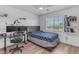 Comfortable bedroom featuring a ceiling fan, and a functional workspace at 4630 E Hazeltine Way, Chandler, AZ 85249