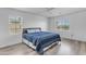 Bright bedroom with a bed, and two windows to let in lots of light at 4630 E Hazeltine Way, Chandler, AZ 85249