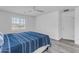 Bright bedroom featuring a large window and a calming blue comforter set at 4630 E Hazeltine Way, Chandler, AZ 85249