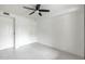 Bright, modern bedroom with sleek ceiling fan, closet, and white interior at 4803 N Woodmere Fairway -- # 1003, Scottsdale, AZ 85251