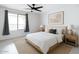 Serene bedroom with natural light, neutral tones, stylish decor, and soft rug at 4803 N Woodmere Fairway -- # 1003, Scottsdale, AZ 85251